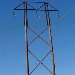 Steel re-framing truss on wood poles.