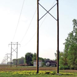 Steel truss on wood poles, shipped pre-assembled for quick installation.